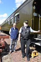 Wayne and Pete prepare to board passengers on coach 218 in Snoqualmie for the April 27 wine train.