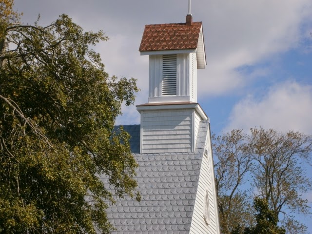 Church shingles with grey Wearcoat preventing rust and Roofdx copper coating belfry roof
