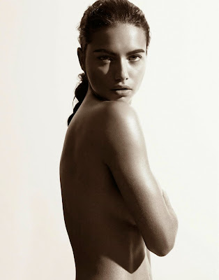 Adriana Lima posed topless for Interview Magazine