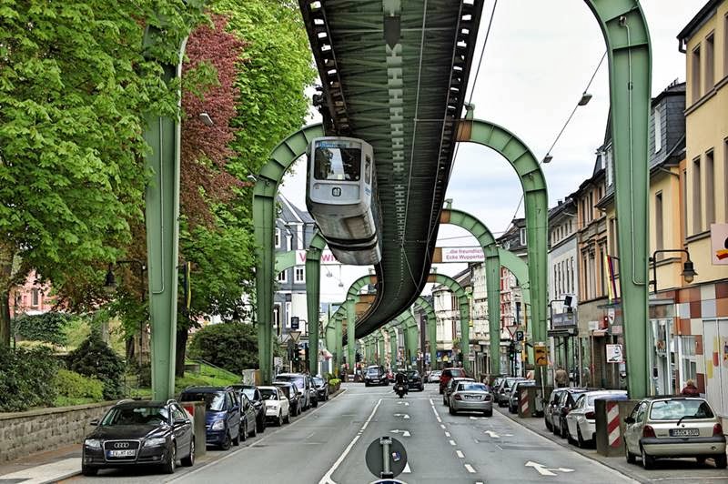 This monorail runs under the track or hang under the track bridge.