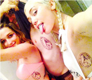 tatuaje-Miley-Cyrus-Perro-Floid