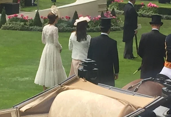 Britain's Catherine, Duchess of Cambridge and Britain's Prince William, Duke of Cambridge attends day 2 of Royal Ascot 