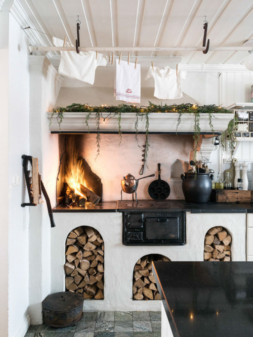 Content in a Cottage Kitchen with Open Fire