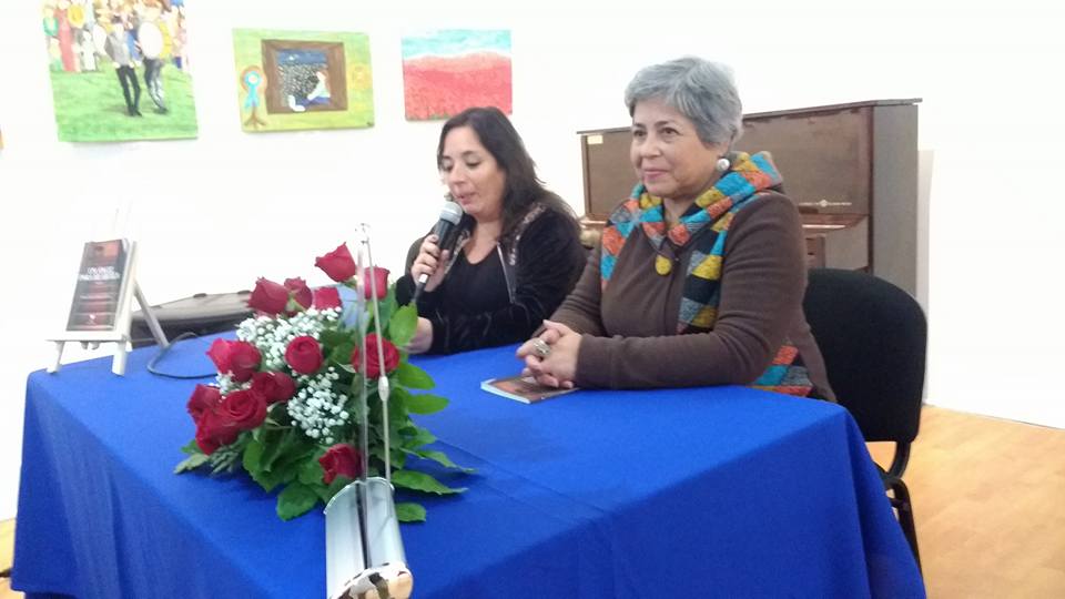 Junto a la poeta  Marcela Reyes Harris