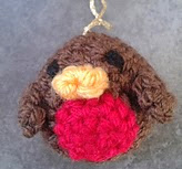 http://www.ravelry.com/patterns/library/little-robin-christmas-tree-decoration