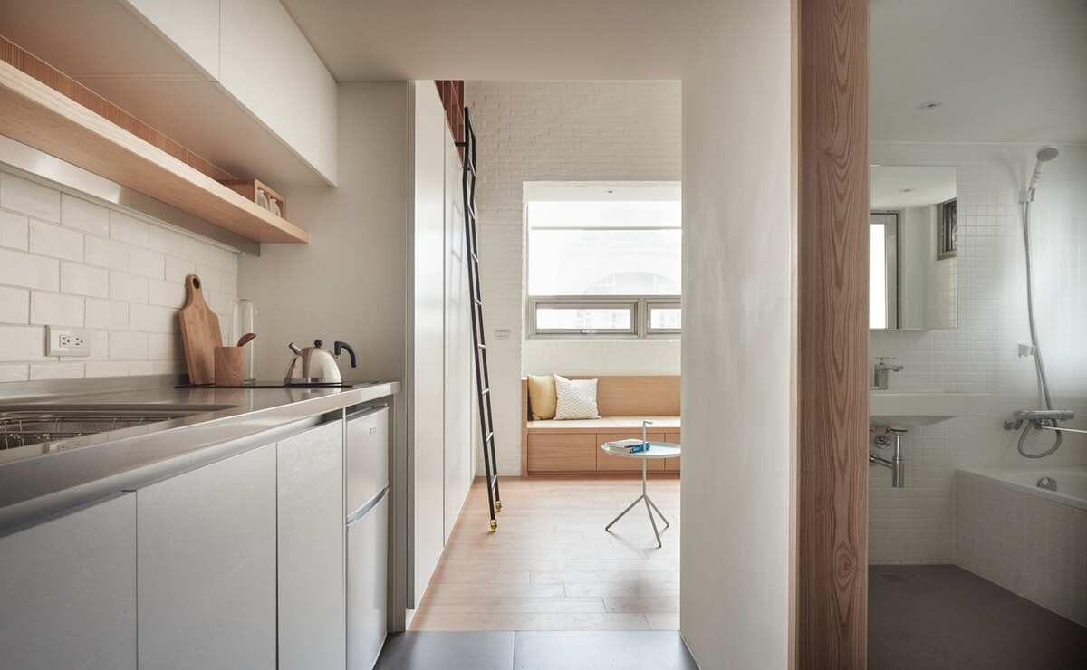 11-Kitchen-Living-Room-and-Bathroom-A-Little-Design-Tiny-Apartment-Smart-Design-Renovation-www-designstack-co