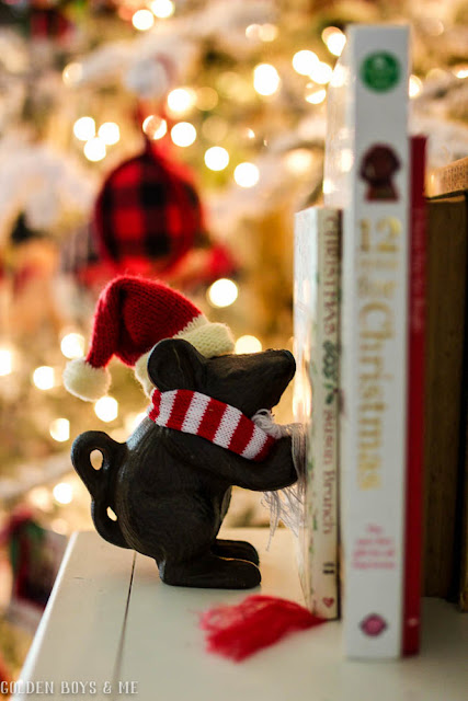 Holiday mouse bookend with hat and scarf to hold Christmas books by the tree