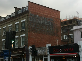 Ghost sign in Camden, London NW1