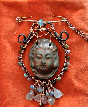 Quan Yin /Om sculpture necklace converts to broche