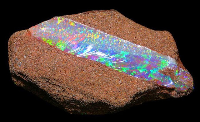 Dazzling and exceptional specimen of Precious Opal in Ironstone matrix!