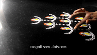 Diya-rangoli-with-bangles-1211af.jpg