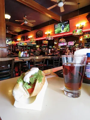 Places to eat in Punta Arenas: a completo (hot dog) and a beer