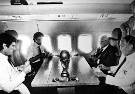 Bearzot, right, playing cards on the plane home from Spain with Dino Zoff, Franco Causio and the Italian president Sandro Pertini