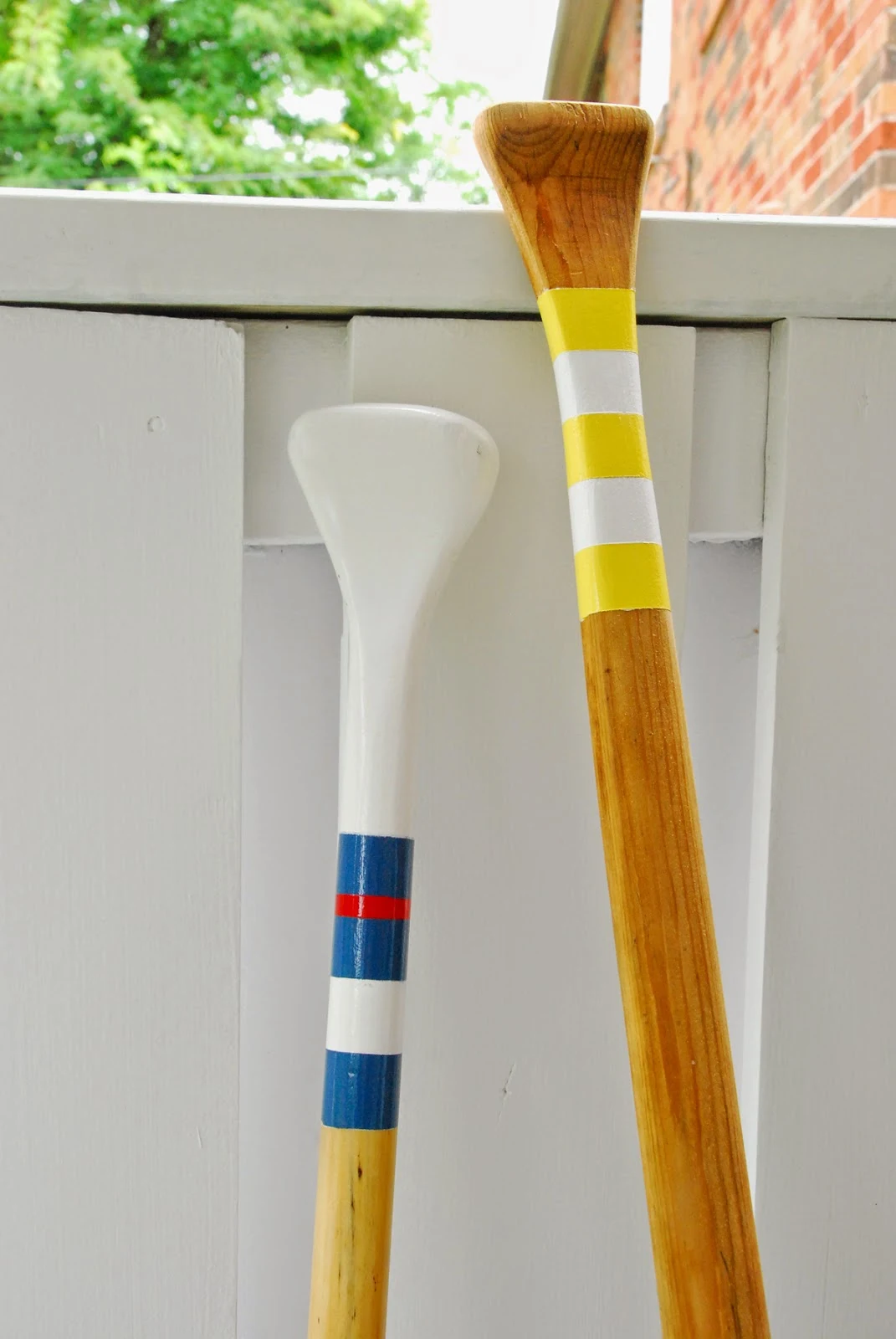 Rambling Renovators | diy nautical oars striped blue white yellow red