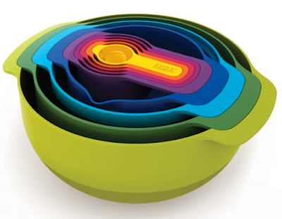 nesting set of bowls, colander, sieve and measuring cups, in bright colors
