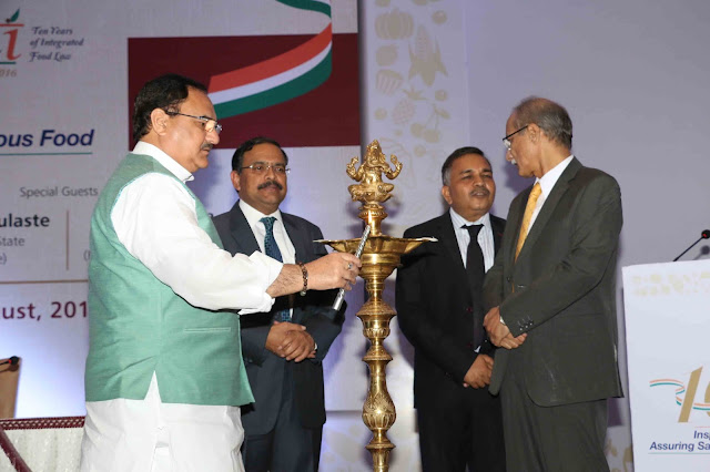 Lighting of the Lamp - Shri J P Nadda, Honourable Union Minister of Health & Family Welfare, Shri C K Mishra, Secretary, Ministry of Health & Family Welfare, Shri Pawan Agarwal, CEO, Food Safety & Standards Authority of India(FSSAI), Shri Ashish Bahuguna, Chairperson, FSSAI Lighting of the Lamp - Shri J P Nadda, Honourable Union Minister of Health & Family Welfare, Shri C K Mishra, Secretary, Ministry of Health & Family Welfare, Shri Pawan Agarwal, CEO, Food Safety & Standards Authority of India(FSSAI), Shri Ashish Bahuguna, Chairperson, FSSAI