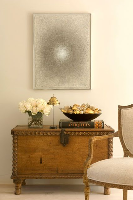Elegant antique trunk and sophisticated design vignette by Peter Vitale