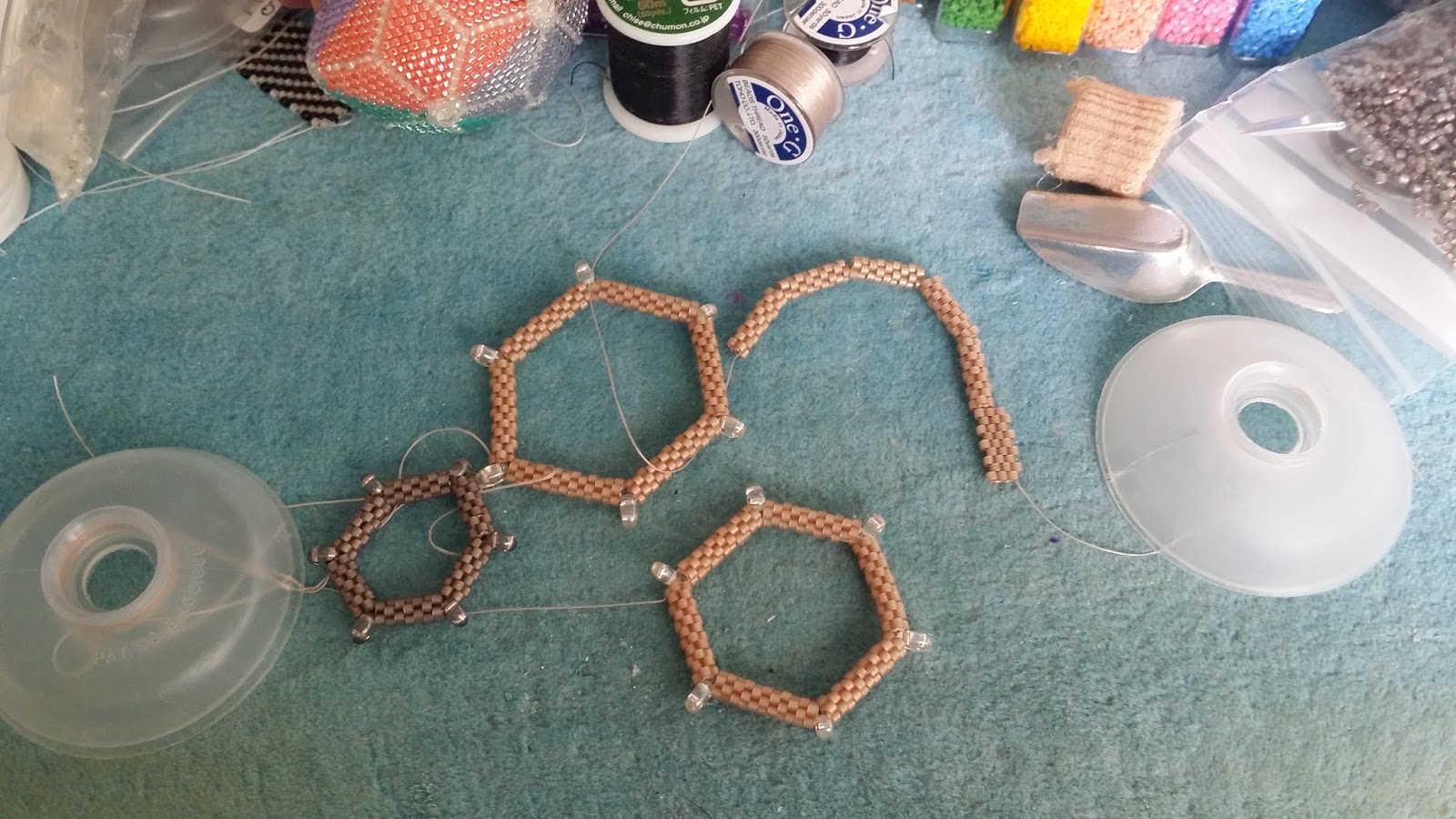 Caring Stitcher Working on a beading PHD