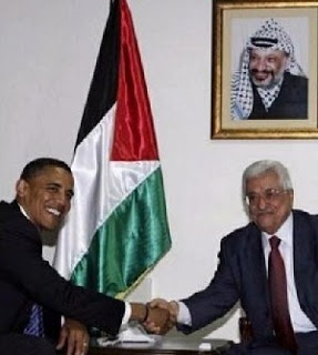 Obama and Abbas under picture of Arafat