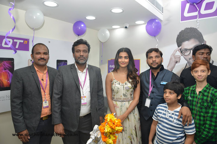 Pooja Hegde at Lot Mobile Store in Vijayawada