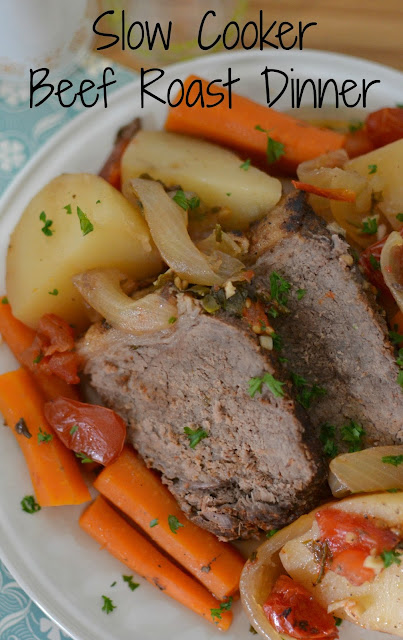 This crock pot meal is easy, hearty and comforting! Great for Sunday dinner or for those busy weeknights! Slow Cooker Beef Roast Dinner Recipe from Hot Eats and Cool Reads