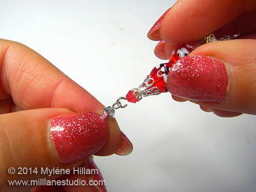 Attaching the crystal dangle to the bottom of the ornament component