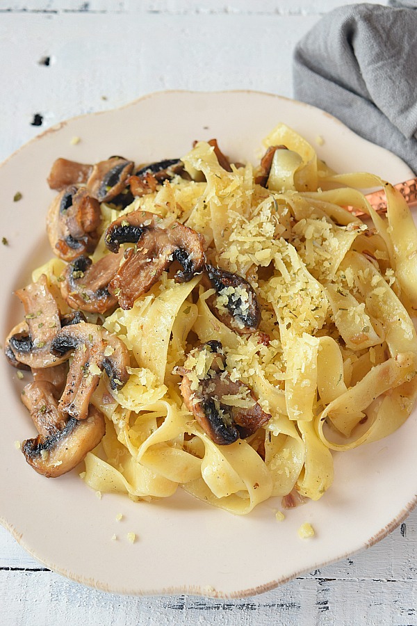 Wonderful Mushroom Pasta topped with sauteed Mushroom and grated Parmesan