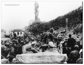 Occupied Greece. April 1941. Sepp Dietrich of the   1st SS Panzer Division "Leibstandarte SS Adolf Hitler"  talks  Greek prisoners. Rare WW2 Images