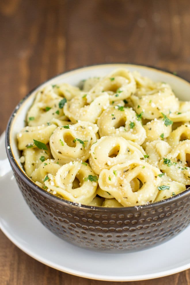 piping hot cheese tortellini served in a simple delicious garlic