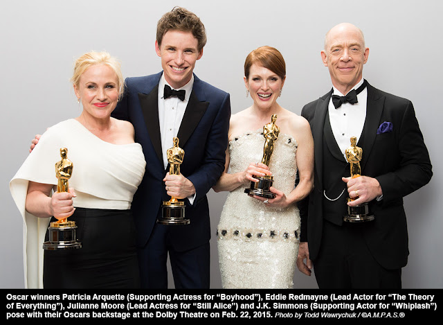 Oscar winners Patricia Arquette (Supporting Actress for “Boyhood”), Eddie Redmayne (Lead Actor for “The Theory of Everything”), Julianne Moore (Lead Actress for “Still Alice”) and J.K. Simmons (Supporting Actor for “Whiplash”) pose with their Oscars backstage at the Dolby Theatre on Feb. 22, 2015.