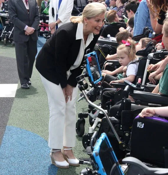 The Countess visited a variety of classroom activities including Science, Design and Technology. blazer and trousers