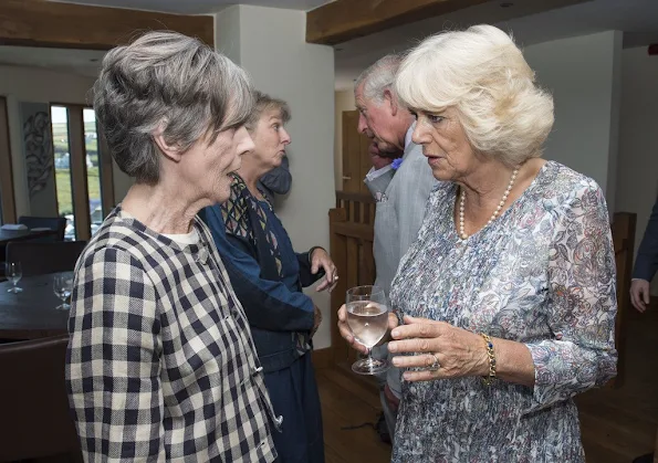 Prince Charles and Duchess Camilla met with members of the TV show 'Doc Martin' at Nathan Outlaw's restaurant