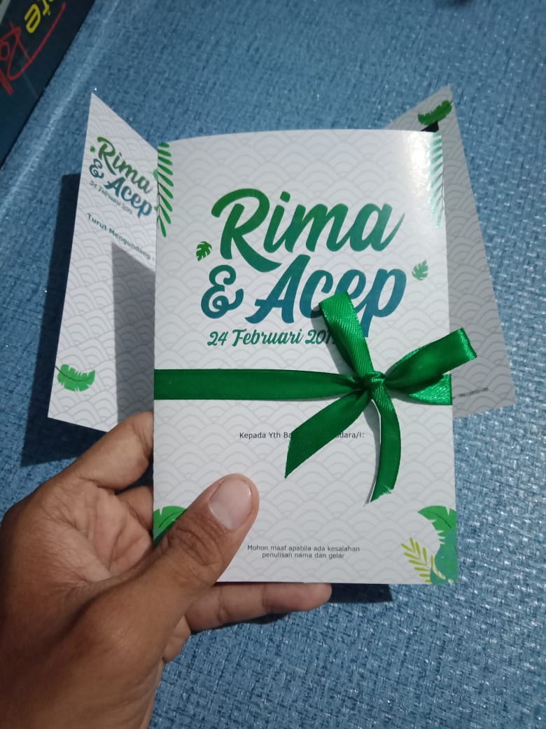 Download Free Undangan Rima Acep PSD Mockup Template