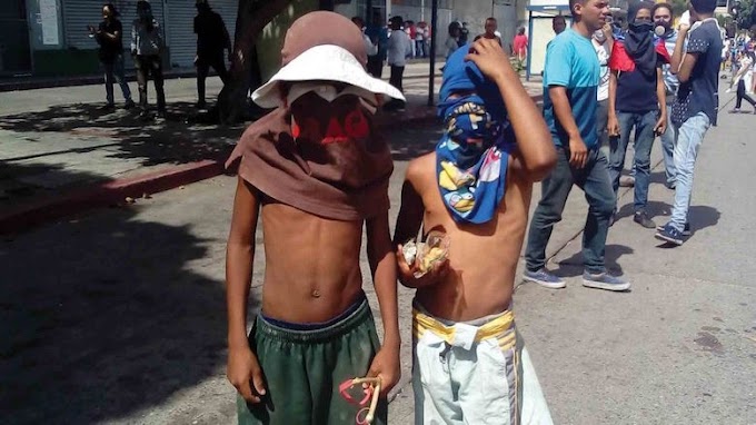 Oposición venezolana usa a niños al frente de sus protestas violentas