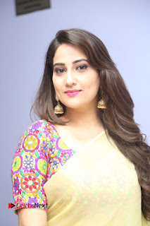 Telugu Actress Anchor Manjusha Stills in Yellow Saree at Janaki Ramudu Audio Launch  0001