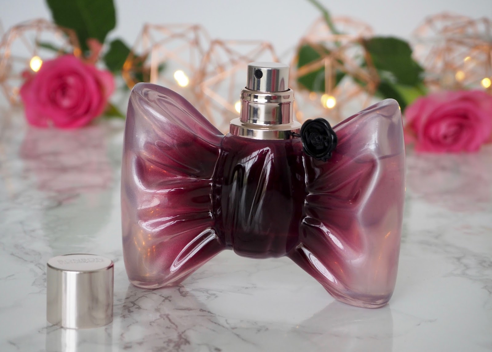 perfume bow shaped bottle