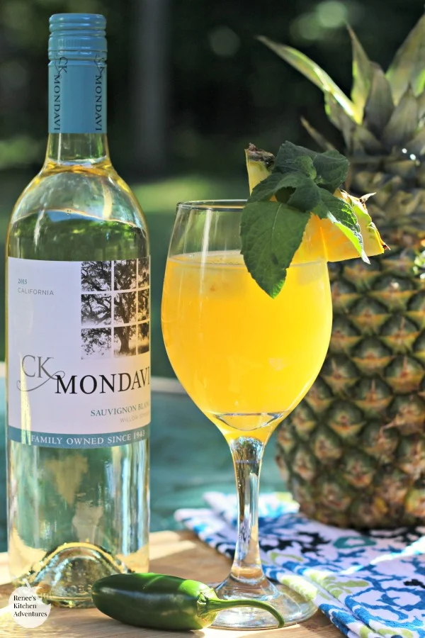Pineapple-Jalapeno Wine Spritzer | by Renee's Kitchen Adventures is an easy recipe for an adult beverage cocktail made with wine, pineapple juice and jalapeno infused simple syrup. #RKArecipes #pineapple #beverage