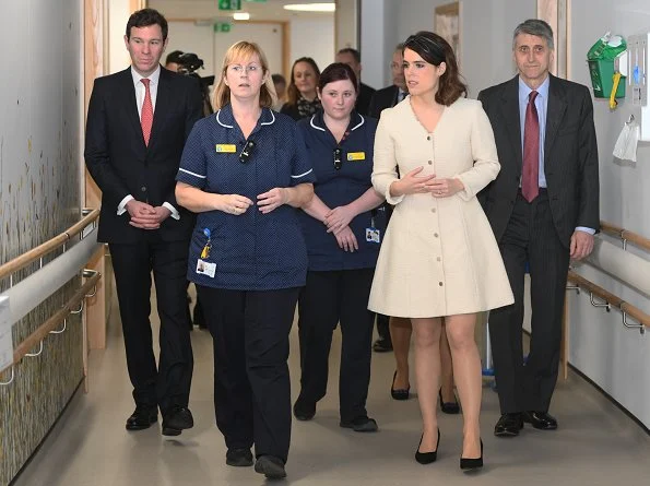 Princess Eugenie wears cream dress as she attends first royal engagement since wedding. tweed dress and Chloe bag