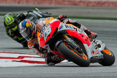 Repsol Honda Team's Spanish rider Dani Pedrosa takes a corner during the third practice session at the Malaysian Grand Prix MotoGP motorcycling race.