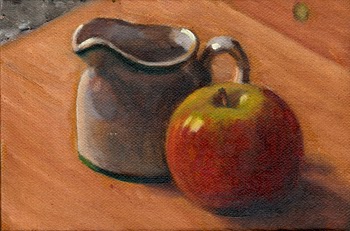 Oil painting of a white porcelain milk jug and a red and green apple on a wooden chopping board.