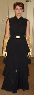 Vintage 1970s Black Teared Maxi-Dress with Pussy Cat Bow and Gold A Retrospective with Gail Carriger