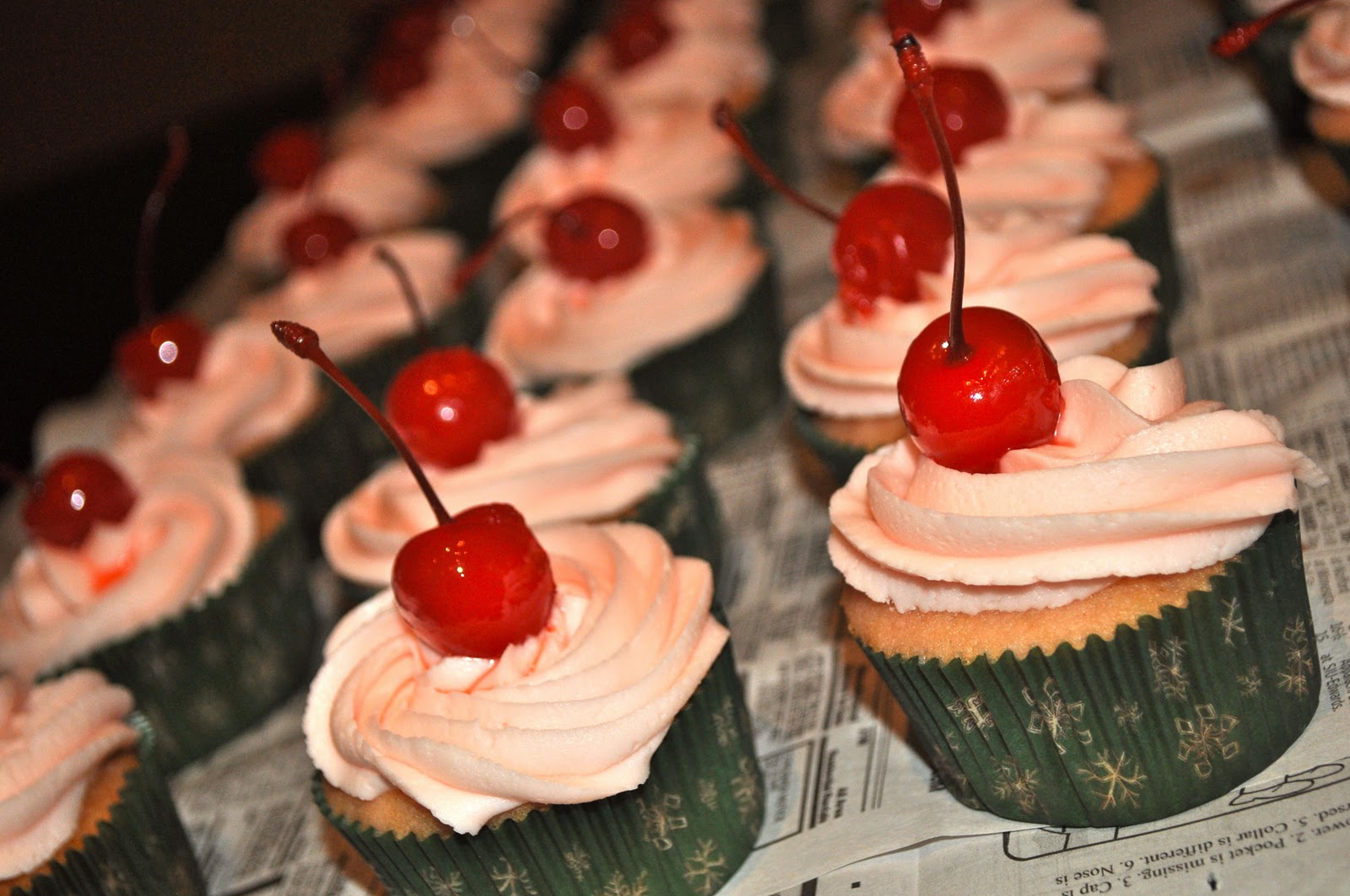 Baker Mandy Cherry Almond Cupcakes with a Cherry Almond Buttercream Frosting