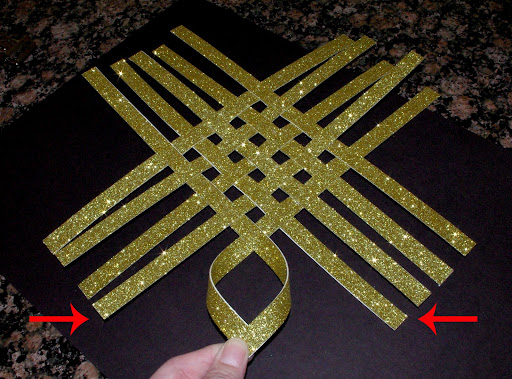 folding each end of gold tree topper