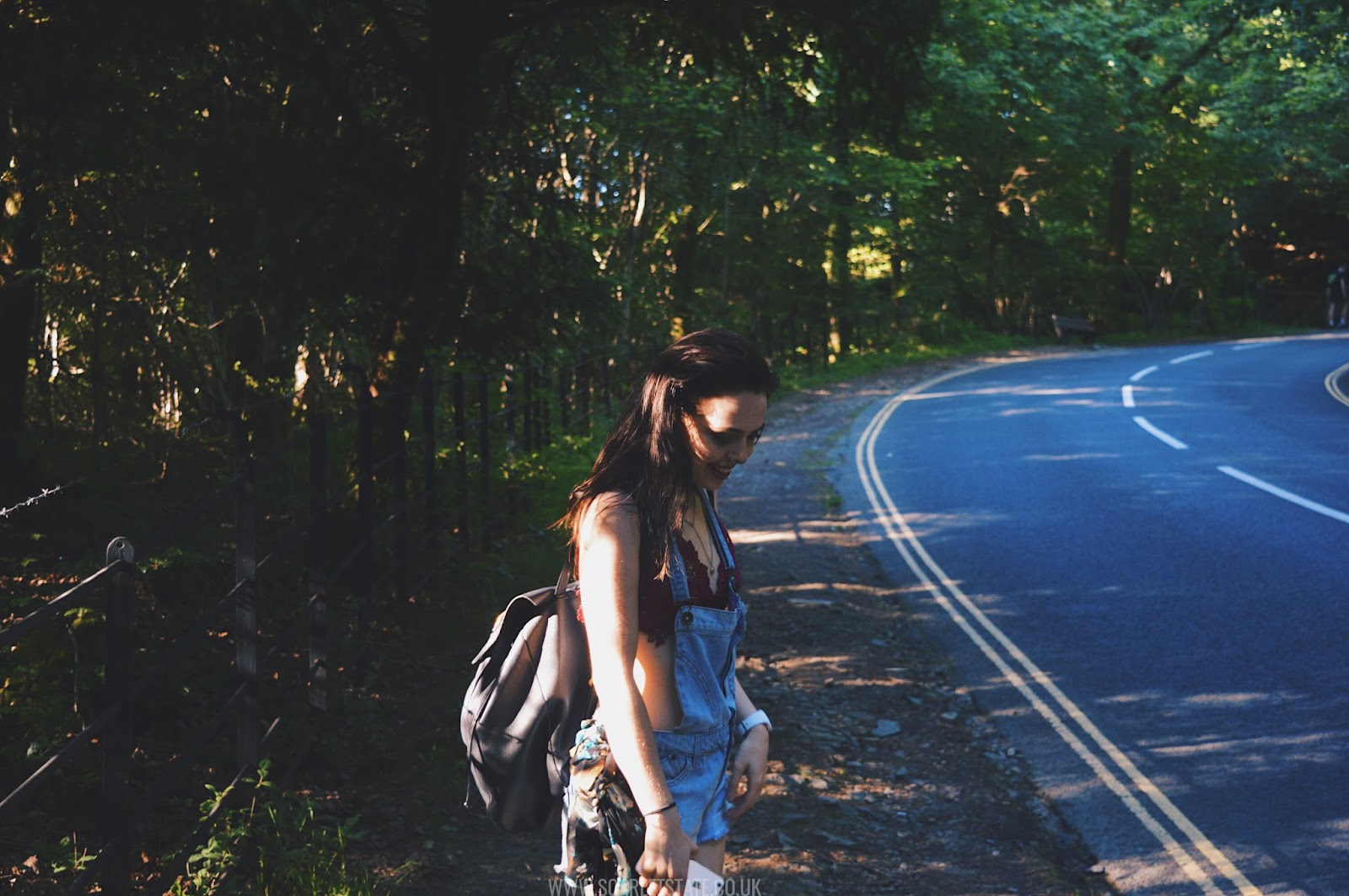 Girl in golden hour in woodland