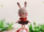 Tiny Bunny Doll: - Height of doll 4.5 cm (without ear) - Made of 100 % cotton crochet thread