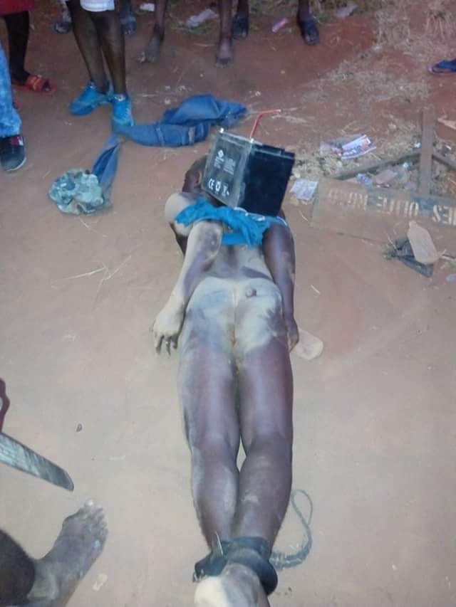 Thief Caught Removing Battery From A Street Light In Asaba Stripped Unclad ...
