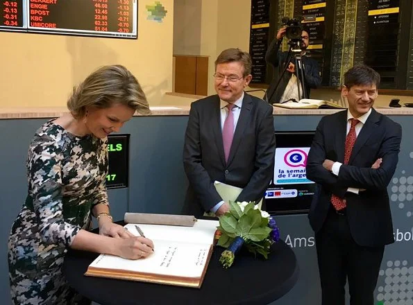 Queen Mathilde gave a speech about financial education and the sustainable development goals at the NYSE Euronext Brussels Stock Exchange in Brussels. Queen wore natan dress