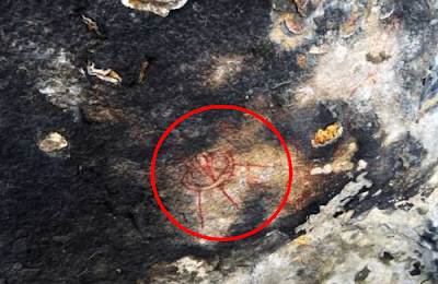 this is a UFO from a rock face from a very long time ago in fact its ancient. Your looking at an ancient UFO drawn on a cave wall.