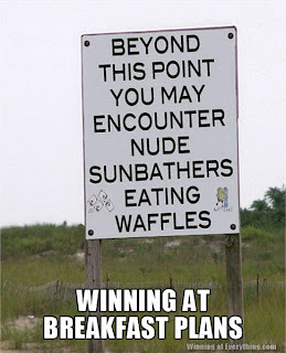 nude sunbathers eating waffles warning sign