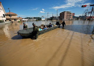 Japan Struggles to Restore Water to Flood-Hit Towns